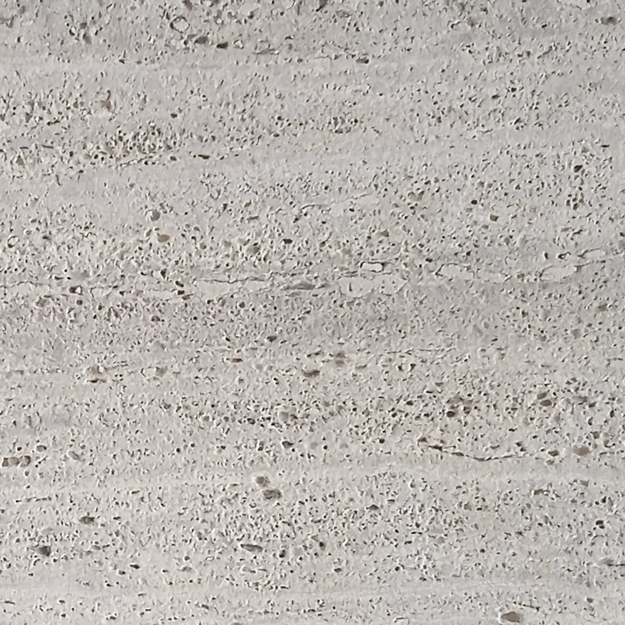 Muestra de Travertino Silver Titanium arenado Muestra de Travertino Silver Titanium arenado